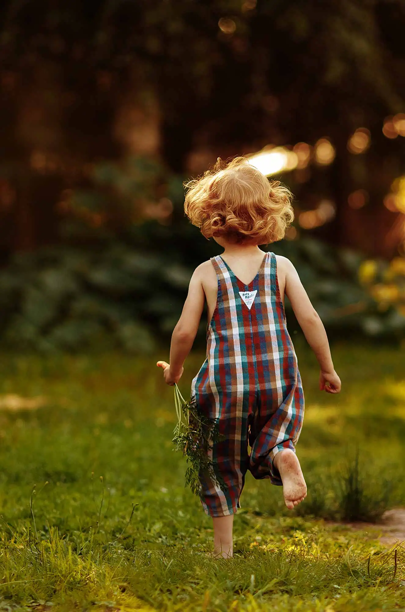 little-girl-running-barefoot-on-the-grass-2025-03-09-17-12-58-utc-scaled-high